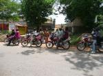 bike taxis to take the team for a celebratory plate of rice and stew